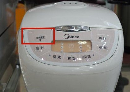 美的电饭煲FD402怎么热饭？