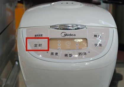 美的电饭煲FD402怎么热饭？
